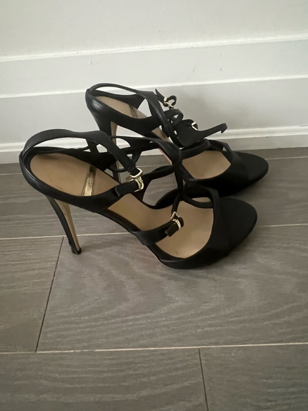 Marciano Black Strappy Stiletto Sandals with Gold Accents